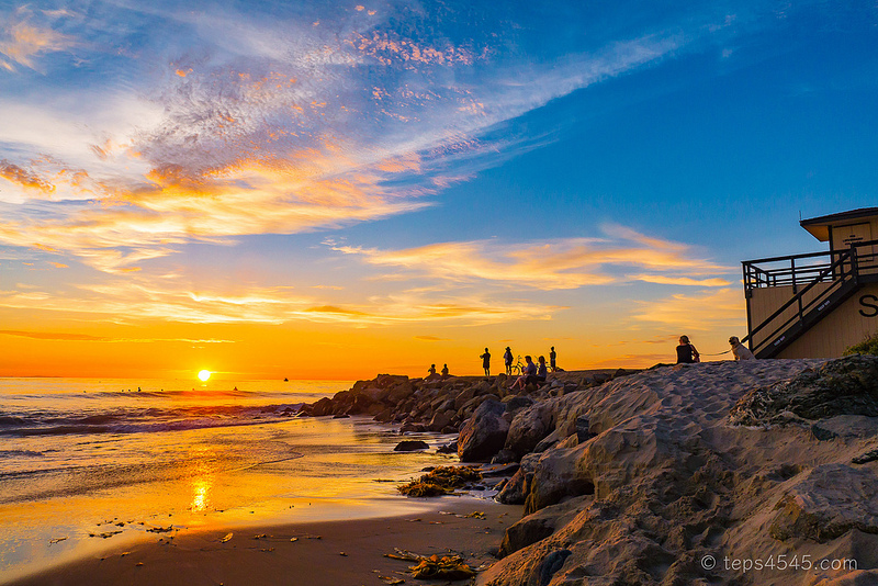 People gazing beautiful sunset